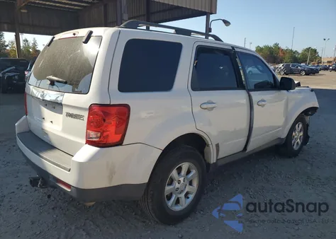 2010 Mazda Tribute I z USA, uszkodzony, nr VIN 4F2CY0C72AKM10013